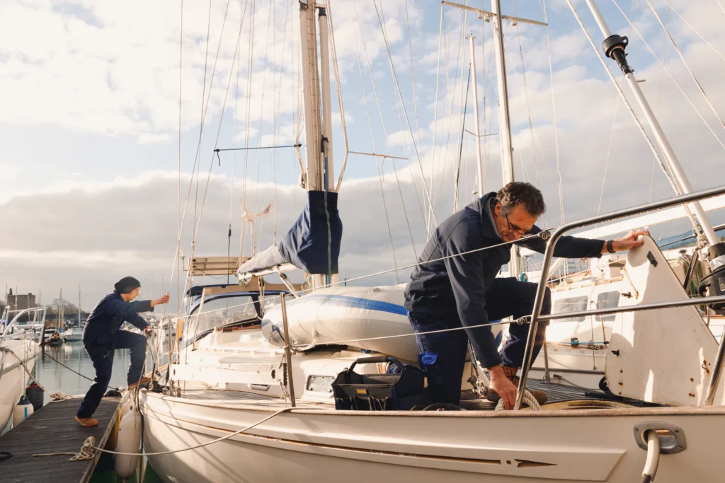 Above_the_Brine_working_on_sail_boat
